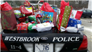 WPD Officers delivering donated gifts to local children during the holidays