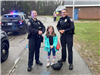 WPD Officers with a young girl